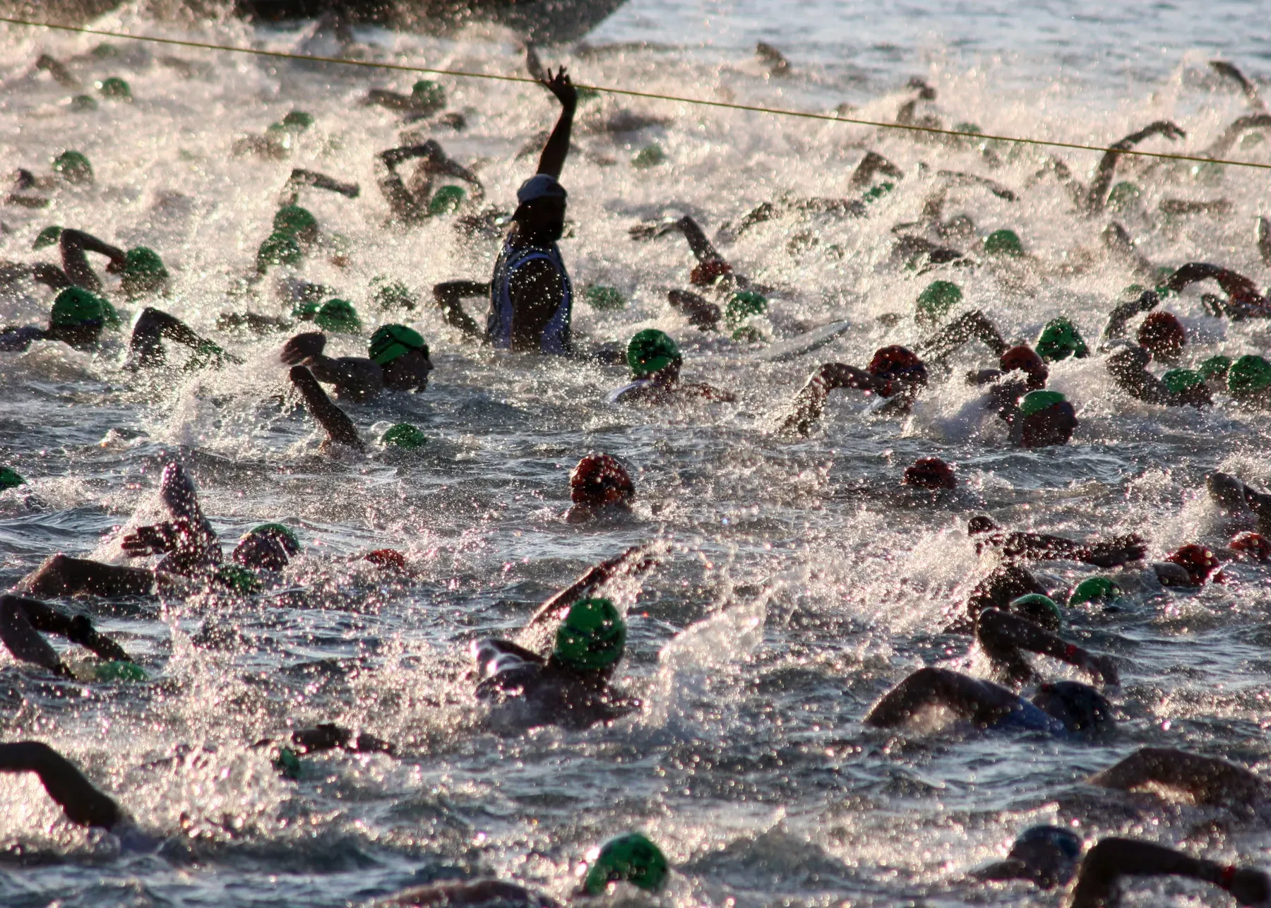 Hundreds of swimmers in the first metres of an ocean swim start